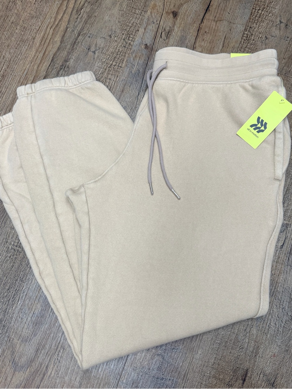 NWT all in motion Women's French Terry Joggers in sand color Drawstring size m